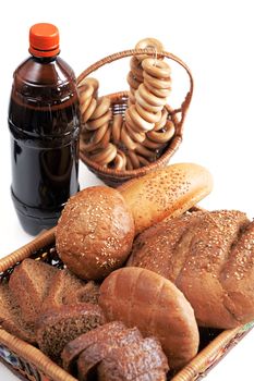 Kvass and grain products on a white background