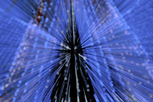 blurred blue lights against a dark background of the night sky