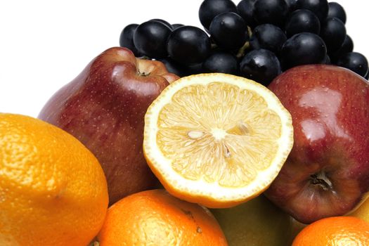 great number of bright and juicy fruit on a white background