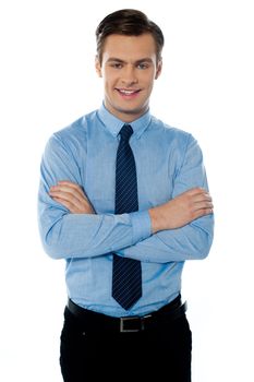 Smiling male businessman with folded arms isolated on white background