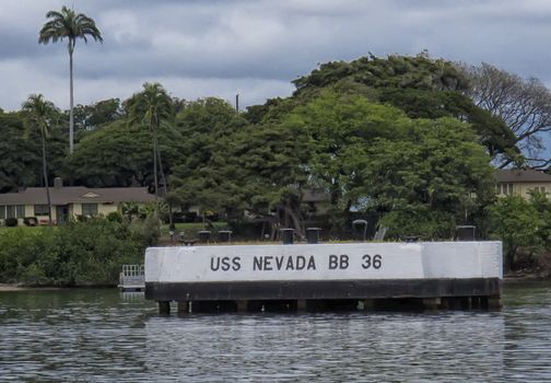 The USS Nevada was the northernmost ship on battleship row, just ahead of the Arizona and was able to make a run for open water on Dec 7 1941. When the smoke cleared around the harbor the USS Nevada sat beached at Hospital Point. The ship was filled with seawater but was still upright, and salvageable. She would fight again, all because of the courage and leadership of junior officers, men like BMC Edwin Hill, and a Machinist who always found enough strength to get the job done.