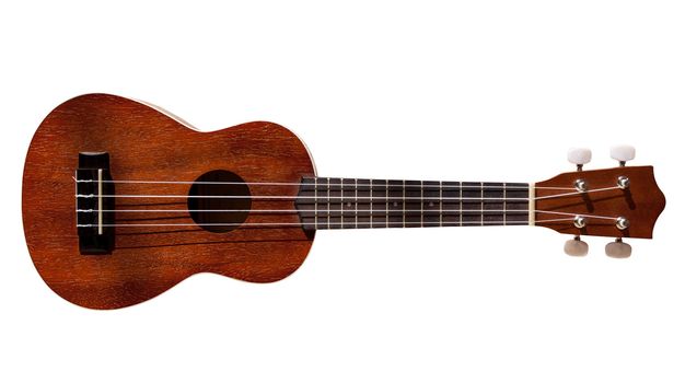 Modern hawaii ukulele guitar isolated against white with four strings