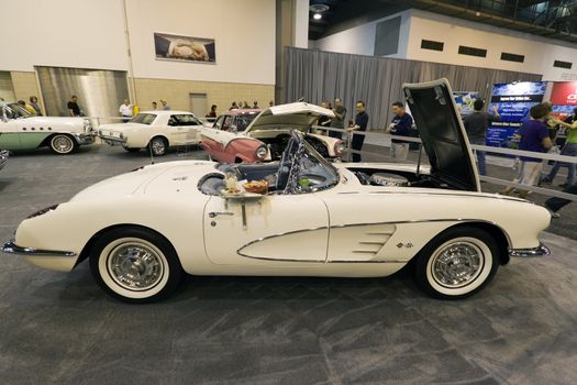 HOUSTON - JANUARY 2012: A classic 1960 white Corvette  at the Houston International Auto Show on January 28, 2012 in Houston, Texas.