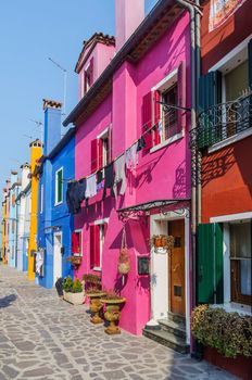 Panorama of the colorful houses Burano. Italy. Vertical view