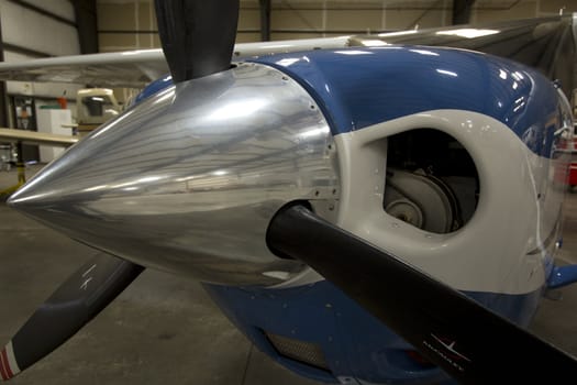 Small airplanes in the shop at an airport.