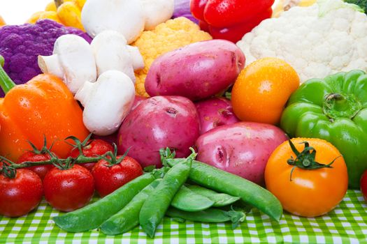 A variety of raw vegetables fresh from the garden.  