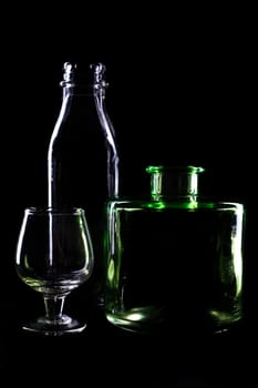 An image of bottles on black background
