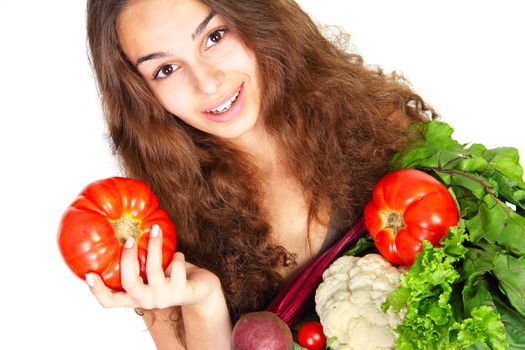 Young woman with vegetables isolated on white background