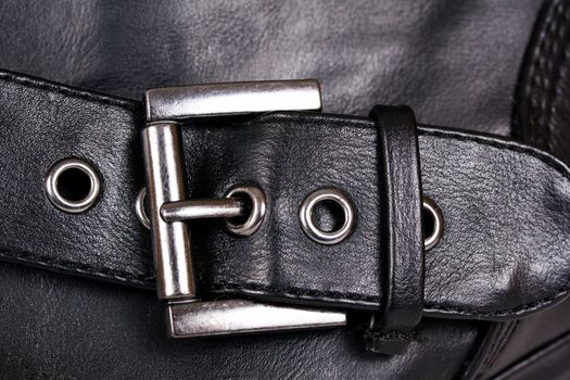 Studded buckle on bag