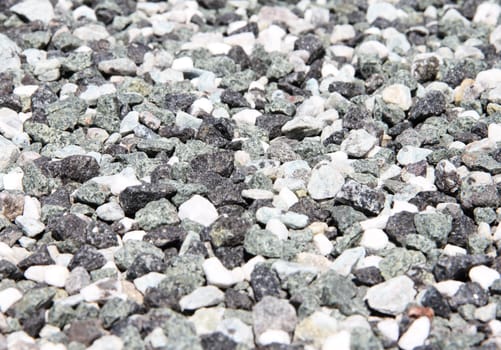 small gray granite stones background macro close-up