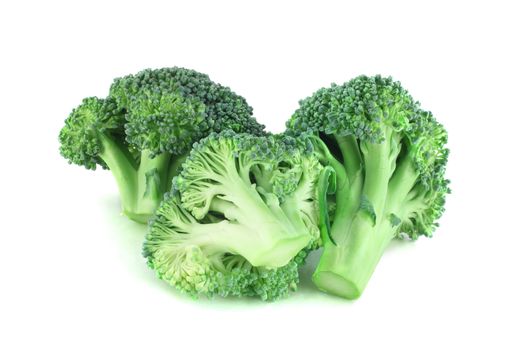 Fresh broccoli pieces isolated on white background