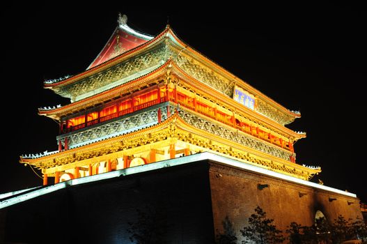 Night view of the famous landmark of Drum Tower in Xian, China