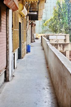 Mumbai, India, corridor serving industrial units on the first floor of an industrial estate