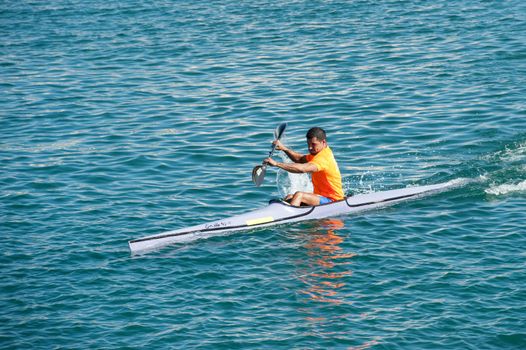 LAS PALMAS, SPAIN – MARCH 10: Unidentified man from club amigos del piraguismo in Canary Islands, kayaking during Boat and Marine Expo FIMAR 2012 on March 10, 2012 in Las Palmas, Spain
