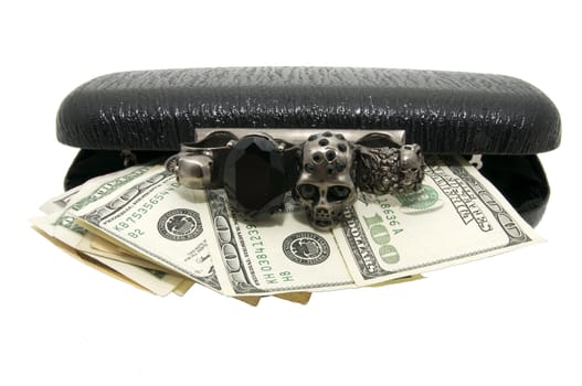 Female black clutch with the lock in the form of brass knuckles with dollars