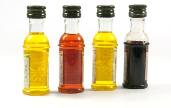 bottles with olive oil in different taste