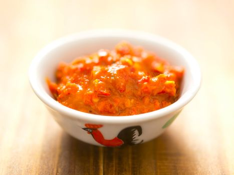 close up of a bowl of fermented shrimp paste