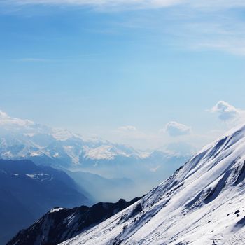 top of mountains in blue sky