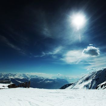 top of mountains in blue sky