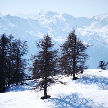 top of mountains sun in blue sky
