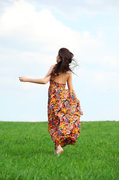 happy woman on green grass 