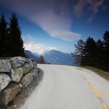 mountain road under blue sky