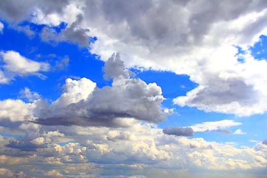 Image of the summer fluffy blue sky
