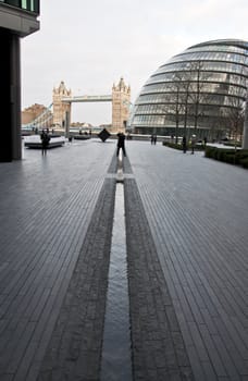 city hall and Thames in modern area in London, UK