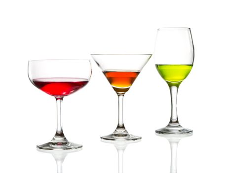 wine glass and colorful cocktail isolated