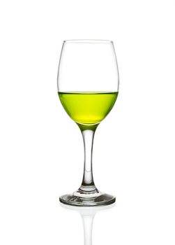 wine glass and green cocktail isolated