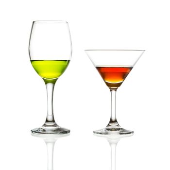 wine glass and green cocktail isolated