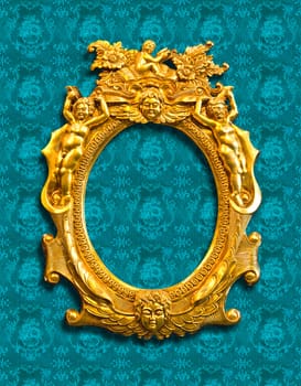 golden sculpture frame on fabric texture with clipping path