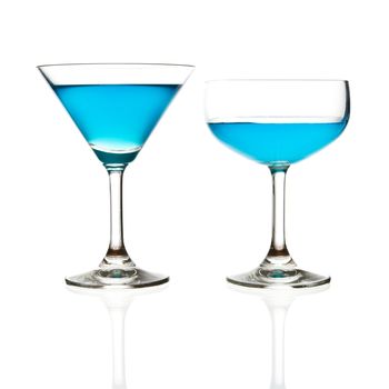 wine glass and blue cocktail isolated