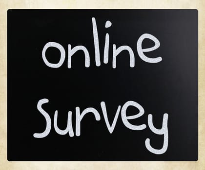 "online survey" handwritten with white chalk on a blackboard