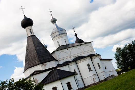 White orthodox church in Ferapontov monastery in summer day
