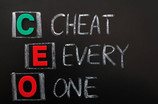 Acronym of CEO - Cheat Every One written in chalk on a blackoard