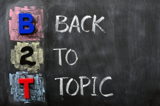 Acronym of B2T - Back to Topic written on a blackboard
