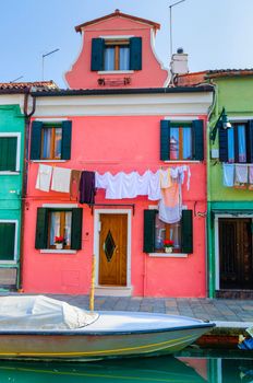 Panorama of the colorful houses Burano. Italy. Vertical view