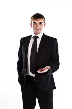 portrait of a young manager for motor with a small red toy car