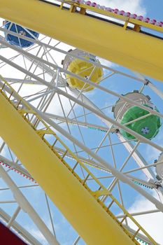 ferris wheel against a blue sky