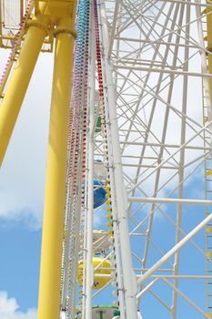 ferris wheel against a blue sky