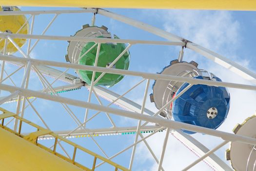 ferris wheel against a blue sky