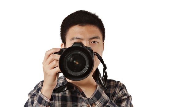 Male photographer holding camera