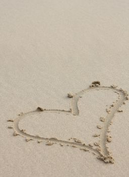 Heart drawn on sand