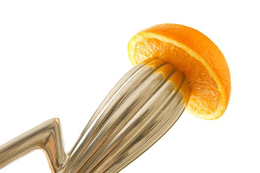 Squeezed orange on juicer. Healthy drink