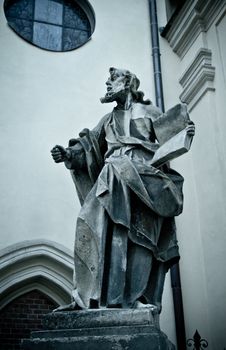 statue with book near Latin Cathedral, Lviv