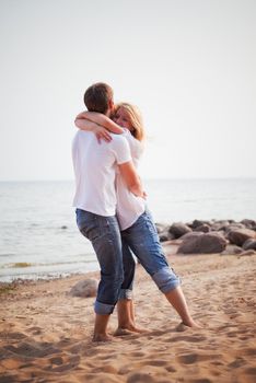 beautiful couple fun on a beach