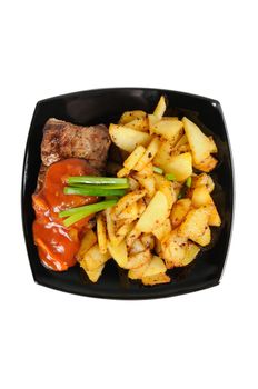 Grilled meat and  fried  potatoes  on a plate. Isolated on white.