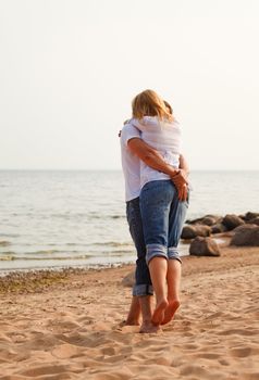 beautiful couple fun on a beach