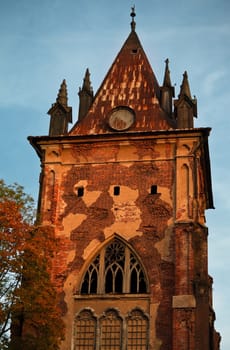 old gothic tower at sunset